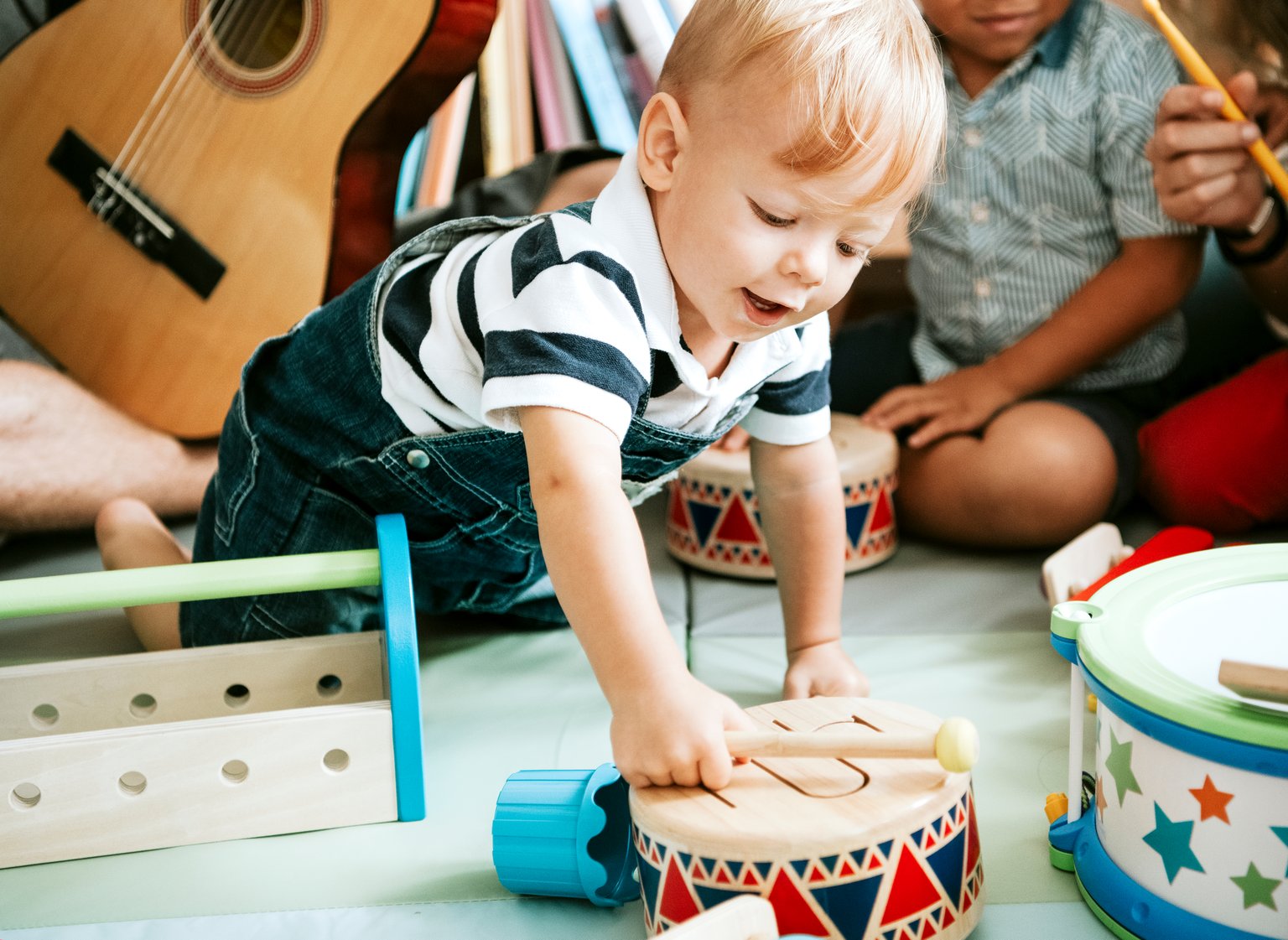 Child Using Percussion Instruments Children playing with percussions